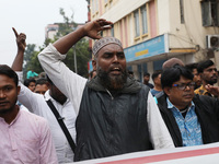 Supporters of the Indian Secular Front (ISF) party seek slogans during a protest march towards the Bangladesh Deputy High Commission against...