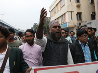 Supporters of the Indian Secular Front (ISF) party seek slogans during a protest march towards the Bangladesh Deputy High Commission against...