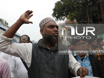 Supporters of the Indian Secular Front (ISF) party seek slogans during a protest march towards the Bangladesh Deputy High Commission against...