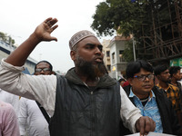 Supporters of the Indian Secular Front (ISF) party seek slogans during a protest march towards the Bangladesh Deputy High Commission against...