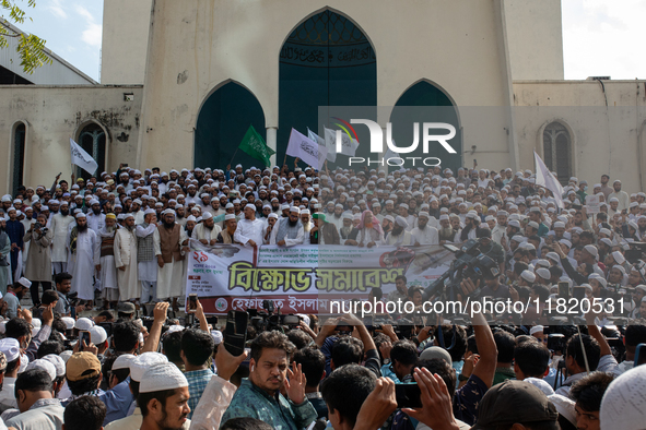 Hefazat-e-Islam supporters stage a protest after Friday prayers at the premises of Baitul Mukarram National Mosque, demanding an immediate b...