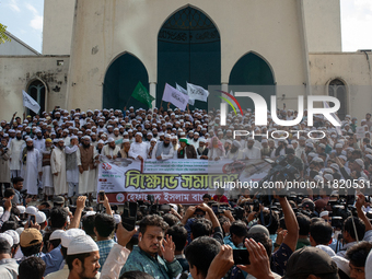 Hefazat-e-Islam supporters stage a protest after Friday prayers at the premises of Baitul Mukarram National Mosque, demanding an immediate b...