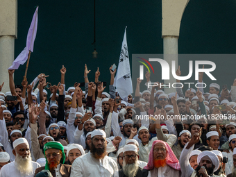 Hefazat-e-Islam supporters stage a protest after Friday prayers at the premises of Baitul Mukarram National Mosque, demanding an immediate b...