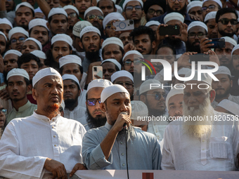 Abu Twaha Adnan, a popular Islamic speaker, delivers his speech at a protest after Friday prayers at the premises of Baitul Mukarram Nationa...