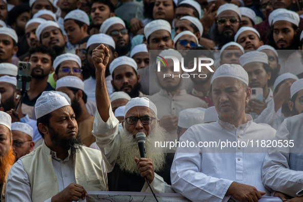 Hefazat-e-Islam supporters stage a protest after Friday prayers at the premises of Baitul Mukarram National Mosque, demanding an immediate b...