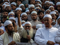 Hefazat-e-Islam supporters stage a protest after Friday prayers at the premises of Baitul Mukarram National Mosque, demanding an immediate b...