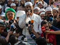 Mamunul Haque, General Secretary of Hefazat-e-Islam Bangladesh's Dhaka Metropolitan, gives a speech at a protest after Friday prayers at the...