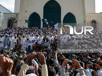 Hefazat-e-Islam supporters stage a protest after Friday prayers at the premises of Baitul Mukarram National Mosque, demanding an immediate b...