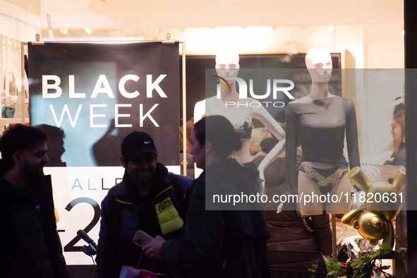 A general view of a Black Friday Sale sign is seen at the city center of Cologne, Germany, on November 29, 2024, during the Black Friday Sal...