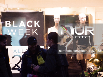 A general view of a Black Friday Sale sign is seen at the city center of Cologne, Germany, on November 29, 2024, during the Black Friday Sal...