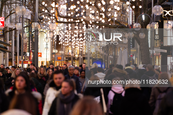 A general view shows a crowd of shoppers at the city center of Cologne, Germany, on November 29, 2024, during the Black Friday Sale. 