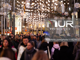 A general view shows a crowd of shoppers at the city center of Cologne, Germany, on November 29, 2024, during the Black Friday Sale. (