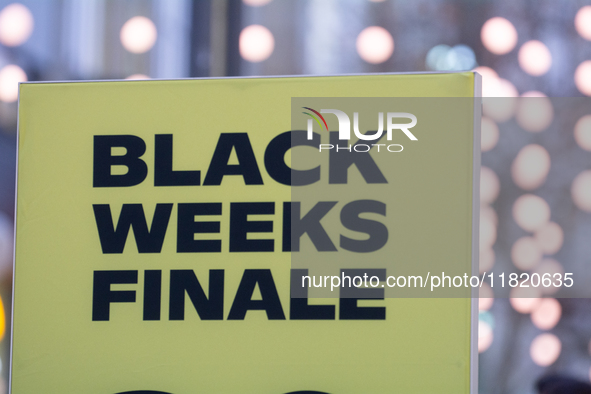 A general view of a Black Friday Sale sign is seen at the city center of Cologne, Germany, on November 29, 2024, during the Black Friday Sal...