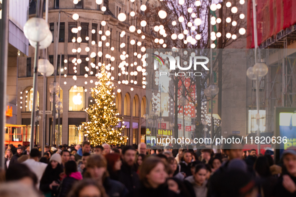 A general view shows a crowd of shoppers at the city center of Cologne, Germany, on November 29, 2024, during the Black Friday Sale. 