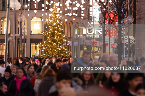 A general view shows a crowd of shoppers at the city center of Cologne, Germany, on November 29, 2024, during the Black Friday Sale. 