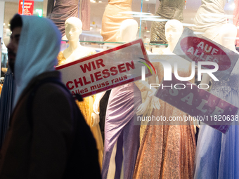 A general view of a Black Friday Sale sign is seen at the city center of Cologne, Germany, on November 29, 2024, during the Black Friday Sal...