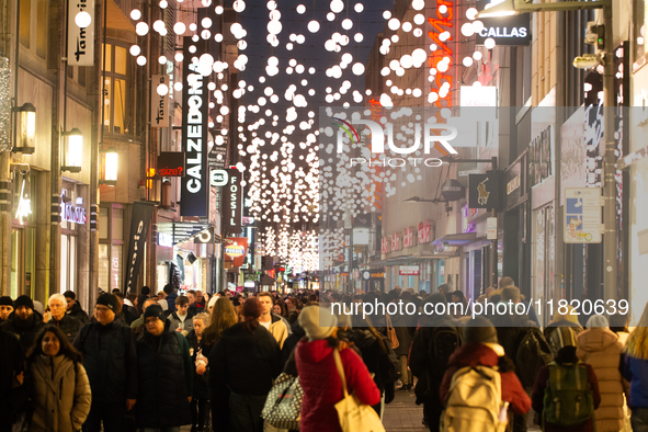 A general view shows a crowd of shoppers at the city center of Cologne, Germany, on November 29, 2024, during the Black Friday Sale. 