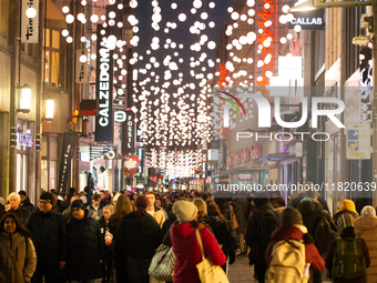 A general view shows a crowd of shoppers at the city center of Cologne, Germany, on November 29, 2024, during the Black Friday Sale. (