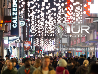 A general view shows a crowd of shoppers at the city center of Cologne, Germany, on November 29, 2024, during the Black Friday Sale. (