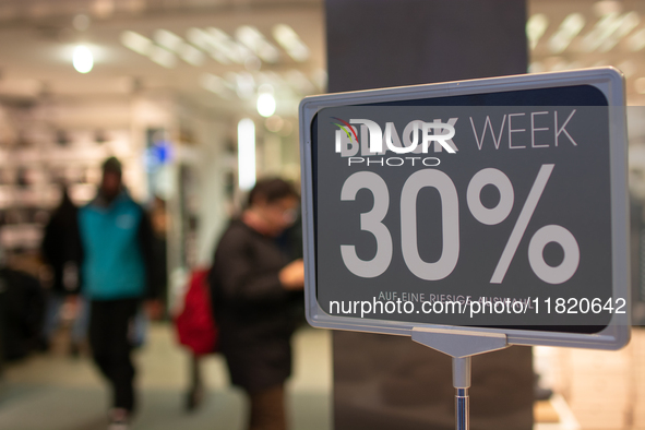 A general view of a Black Friday Sale sign is seen at the city center of Cologne, Germany, on November 29, 2024, during the Black Friday Sal...