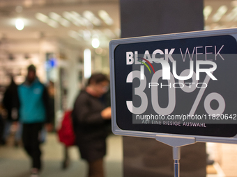 A general view of a Black Friday Sale sign is seen at the city center of Cologne, Germany, on November 29, 2024, during the Black Friday Sal...