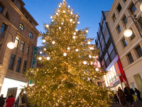 A general view of a Christmas tree is seen at the city center of Cologne, Germany, on November 29, 2024, during the Black Friday Sale. (