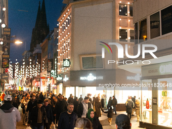 A general view shows a crowd of shoppers at the city center of Cologne, Germany, on November 29, 2024, during the Black Friday Sale. (