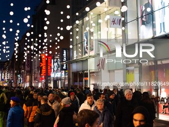 A general view shows a crowd of shoppers at the city center of Cologne, Germany, on November 29, 2024, during the Black Friday Sale. (