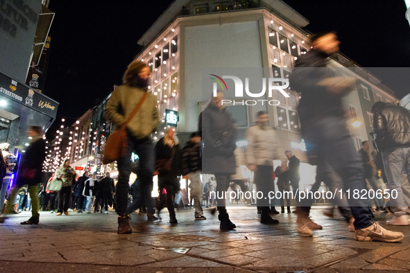 A general view shows a crowd of shoppers at the city center of Cologne, Germany, on November 29, 2024, during the Black Friday Sale. 