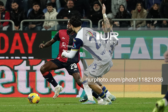 Antoine Makoumbou (#29 Cagliari Calcio) and Giangiacomo Magnani (Hellas Verona FC) participate in the Serie A TIM match between Cagliari Cal...