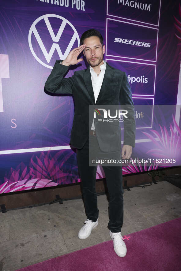 Juan Solo attends the pink carpet for the 14th anniversary of Estilo DF at General Prim 30 in Mexico City, Mexico, on November 28, 2024. 