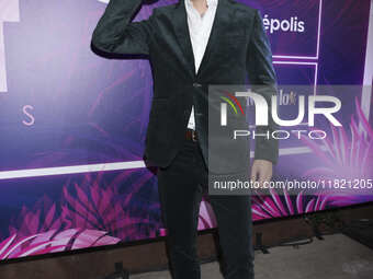 Juan Solo attends the pink carpet for the 14th anniversary of Estilo DF at General Prim 30 in Mexico City, Mexico, on November 28, 2024. (