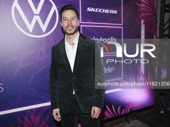 Juan Solo attends the pink carpet for the 14th anniversary of Estilo DF at General Prim 30 in Mexico City, Mexico, on November 28, 2024. (