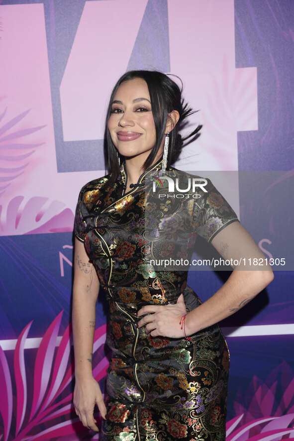 Jass Reyes attends the pink carpet for the 14th anniversary of Estilo DF at General Prim 30 in Mexico City, Mexico, on November 28, 2024. 