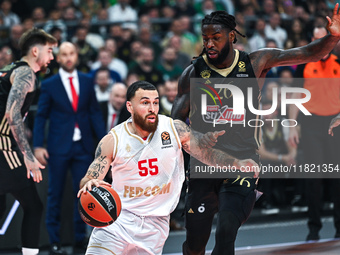 Mike James of AS Monaco competes with Mathias Lessort of Panathinaikos AKTOR Athens during the Euroleague, Round 12 match between Panathinai...