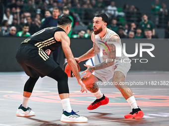 Mike James of AS Monaco competes with Kostas Sloukas of Panathinaikos AKTOR Athens during the Euroleague, Round 12 match between Panathinaik...