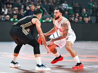 Mike James of AS Monaco competes with Kostas Sloukas of Panathinaikos AKTOR Athens during the Euroleague, Round 12 match between Panathinaik...