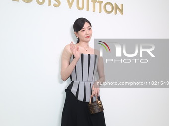 Taiwanese actress Puff Kuo attends the opening ceremony of the flagship store of Louis Vuitton in Taipei, Taiwan province, China, on Novembe...