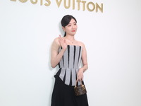 Taiwanese actress Puff Kuo attends the opening ceremony of the flagship store of Louis Vuitton in Taipei, Taiwan province, China, on Novembe...