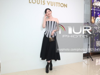 Taiwanese actress Puff Kuo attends the opening ceremony of the flagship store of Louis Vuitton in Taipei, Taiwan province, China, on Novembe...