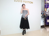 Taiwanese actress Puff Kuo attends the opening ceremony of the flagship store of Louis Vuitton in Taipei, Taiwan province, China, on Novembe...