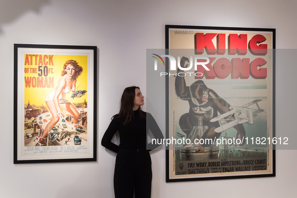 LONDON, UNITED KINGDOM - NOVEMBER 29, 2024: A staff member looks at the original 1933 film poster for 'King Kong' (estimate: GBP25,000-35,00...