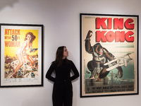 LONDON, UNITED KINGDOM - NOVEMBER 29, 2024: A staff member looks at the original 1933 film poster for 'King Kong' (estimate: GBP25,000-35,00...