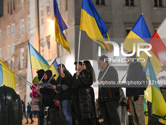 KRAKOW, POLAND - NOVEMBER 29:
On the evening of the 1010th day of Russia's invasion of Ukraine, a few members of the Ukrainian diaspora held...