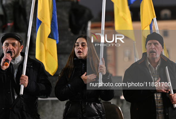 KRAKOW, POLAND - NOVEMBER 29:
On the evening of the 1010th day of Russia's invasion of Ukraine, a few members of the Ukrainian diaspora held...