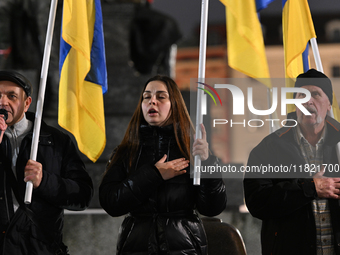 KRAKOW, POLAND - NOVEMBER 29:
On the evening of the 1010th day of Russia's invasion of Ukraine, a few members of the Ukrainian diaspora held...