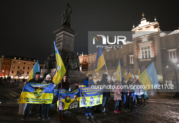 KRAKOW, POLAND - NOVEMBER 29:
On the evening of the 1010th day of Russia's invasion of Ukraine, a few members of the Ukrainian diaspora held...