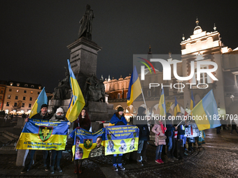 KRAKOW, POLAND - NOVEMBER 29:
On the evening of the 1010th day of Russia's invasion of Ukraine, a few members of the Ukrainian diaspora held...