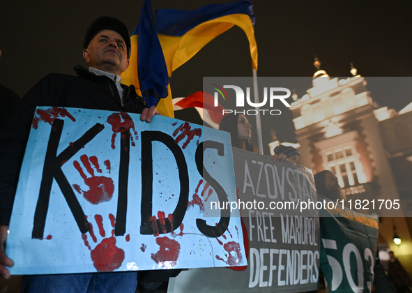 KRAKOW, POLAND - NOVEMBER 29:
On the evening of the 1010th day of Russia's invasion of Ukraine, a few members of the Ukrainian diaspora held...