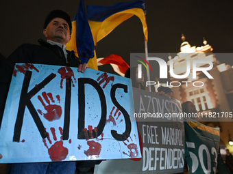 KRAKOW, POLAND - NOVEMBER 29:
On the evening of the 1010th day of Russia's invasion of Ukraine, a few members of the Ukrainian diaspora held...